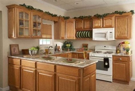But first i want to decorate above the kitchen cabinets. Lovely Greenery Above Kitchen Cabinets | Kitchen remodel ...