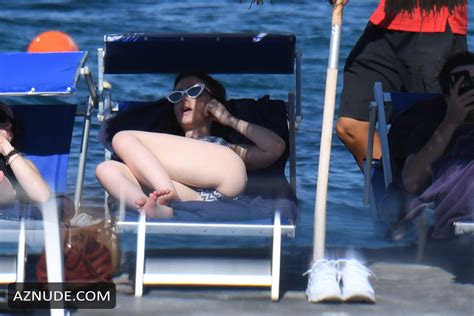 Lily Collins Sexy On The Beach In Ischia Aznude