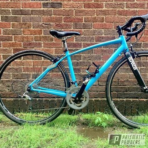 Bicycle And Accessories Powder Coated In Gumball Blue And Ink Black