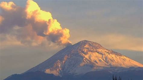 Mexico Popocatepetl Volcano Spews Ash And Smoke Into Red Tinted Sky