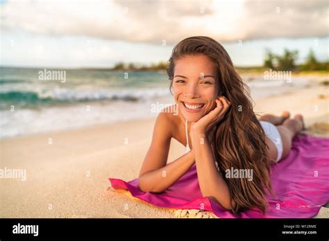 Happy Asian Bikini Wwoman Model Relaxing On Summer Vacation Lying On