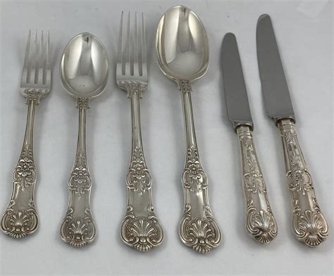 A Fine Antique Silver Queens Pattern Flatware Service For 12 All Made