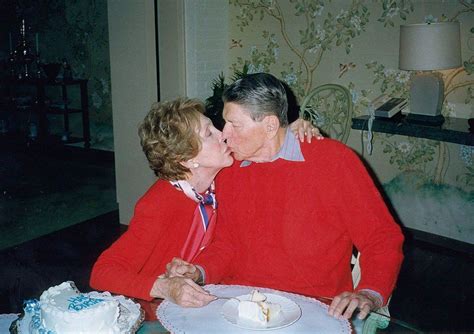 Undated File Photo Former President Ronald Reagan Gets A Kiss From His Wife Nancy On The