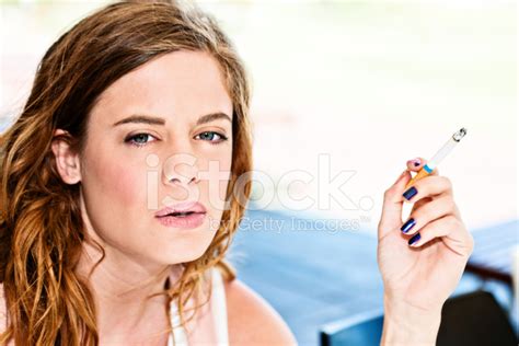 Beautiful Young Woman Smoking Cigarette Stock Photos