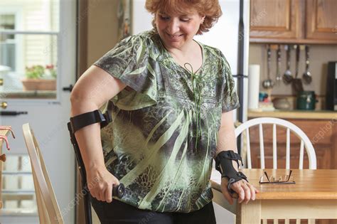 Woman Using Her Hand Brace And Crutch Stock Image F0124092