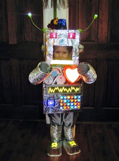 For halloween, i made a cyborg arm costume! SUUUUUPER cute robot costume. I need this in big kid size... | Robot halloween costume, Robot ...