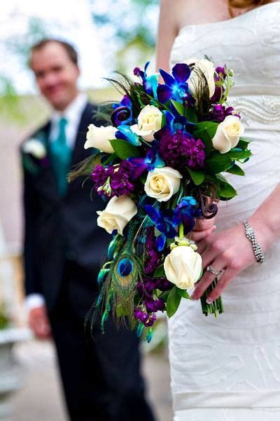 Our theme was peacock feathers and pearls with indigo, black & jade green as our colours. Peacock inspired cascade bridal bouquet by Best Day Floral ...