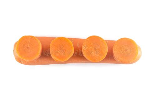 Fresh Large Carrot With Some Slices On White Background Stock Image