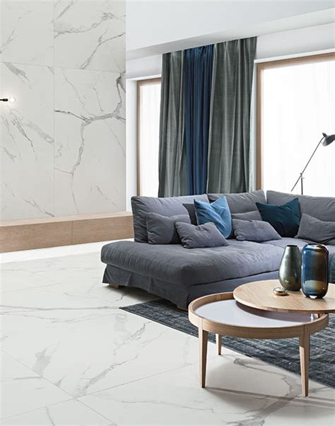 Large format porcelain tile is the new concept in flooring that helps minimize grout lines. Specchio Carrara 60x120. White marble look porcelain tiles.