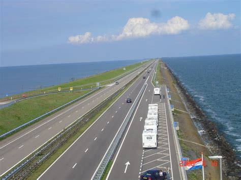 Afsluitdijk, the stunning netherlands causeway that protects against floods, attracts 200,000 international tourists every year. The Panorama of AFSLUITDIJK in North Netherlands | The ...