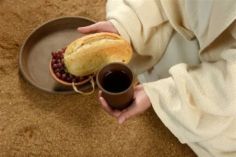 Jesus Hands Holding Bread And Wine — Stock Photo © Ginosphotos1 18415285