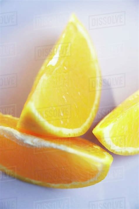 Three Orange Wedges Stock Photo Dissolve