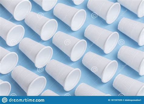 Single Use White Plastic Cups On A Blue Background Stock Image Image Of Background Litter