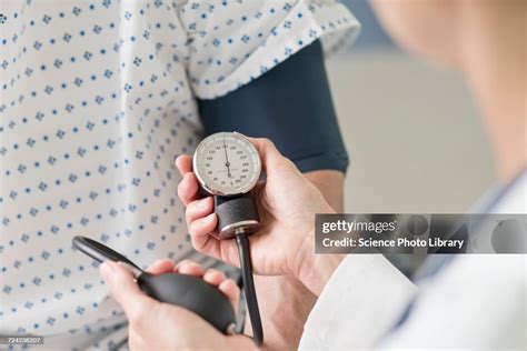 Doctor Taking Patients Blood Pressure High Res Stock Photo Getty Images