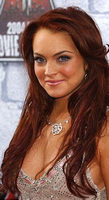 We set the coloring formula of her hair. Lindsay Lohan tops up blindingly bright locks ...