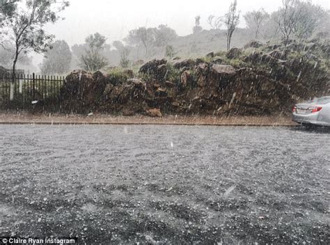 alice springs residents make the most of a massive hail storm using hail to cool beer daily