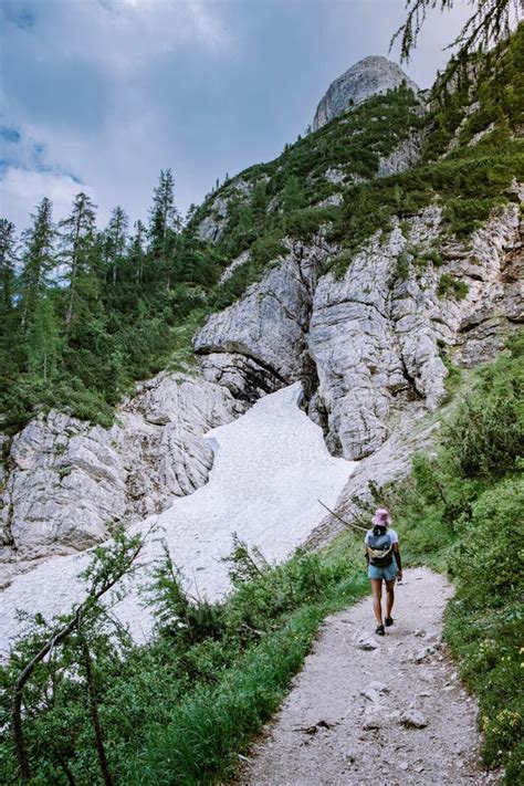 Woman Hiking In The Italian Dolomites Girl Hiking To Lago Di Sorapis