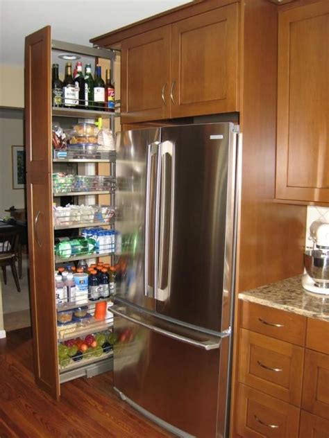 The first mistake people make with cabinets is organizing inside the lines of shelving. Pull-Out Pantry Cabinet | Pantry cabinet, Tall kitchen ...