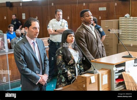 Jonathan Majors stands in court during a hearing in his domestic