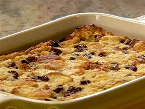In another bowl, mix and crumble together brown sugar, 1/4 cup softened butter and pecans. Rum Raisin Bread Pudding Recipe | The Neelys | Food Network