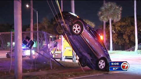 Driver Handcuffed After Car Crashes Into Pole In Nw Miami Dade Wsvn