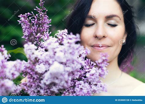 Large Portrait Of An Attractive Woman Lilac Lips And Lilac Eyeshadow And Lilac Blush Stock