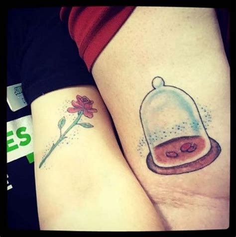 Couple tattoos are permanent and eternal, symbolizing passion, commitment, loyalty, and faith. Couple who decided to get 'romantic' matching Disney ...