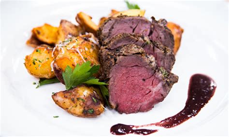 Transfer roast to a cutting board to rest; Cristina Cooks - Beef Tenderloin With Parmesan Garlic Roasted Potatoes | Hallmark Channel