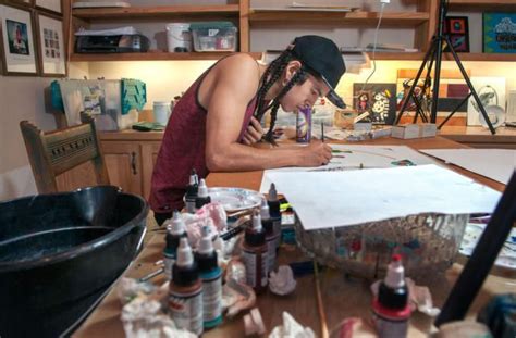 Ehren Kee Natay Works On A Watercolor Painting In Preparation For An