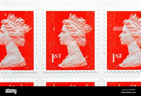 Red British First Class Royal Mail Postage Stamps Stock Photo Alamy