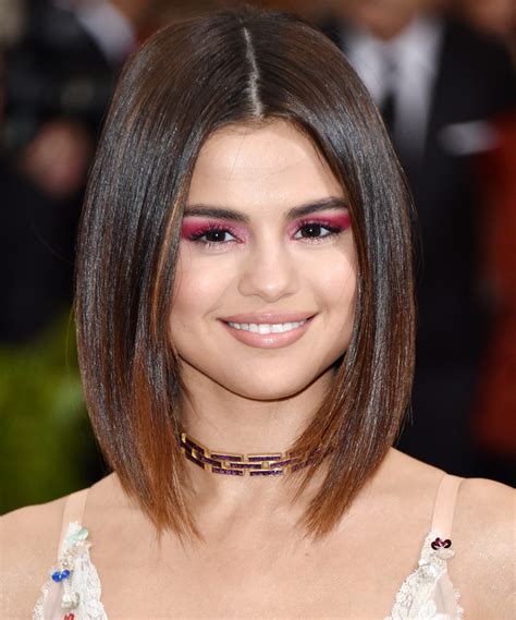 Selena quintanilla perez selena and chris selena selena buffy selena mexican divas beautiful person role models short hair styles. Selena Gomez's Best Hair Moments | InStyle.com