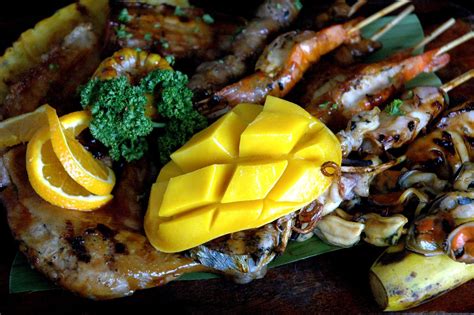 DUDE FOR FOOD: Luau in the Metro: A Hawaiian Feast at The Original ...