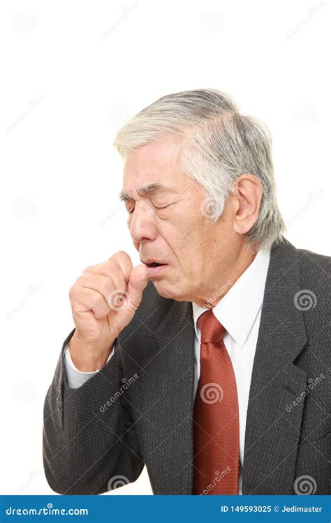 Studio Shot Of Senior Japanese Businessman Coughing Stock Image Image