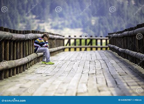Sad Boy Sitting Alone Stock Image Image Of Board Homeless 64282987