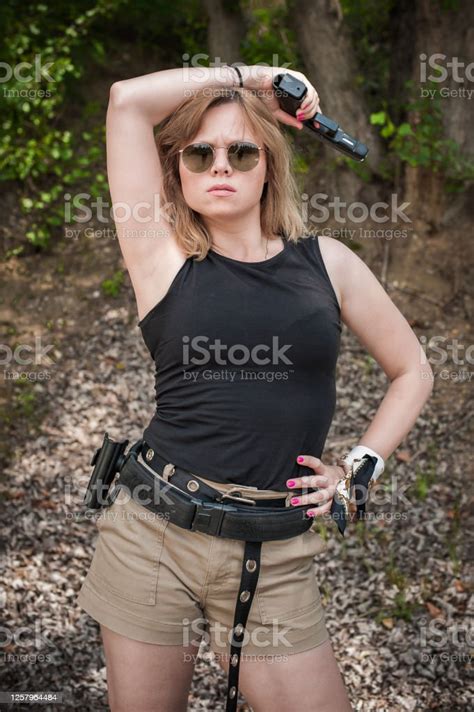 Attractive Female Army Soldier Posing With Gun Woman With Weapon Stock