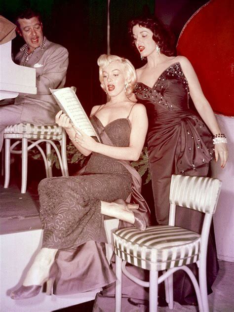 Marilyn Monroe And Jane Russell Going Over Music On The Set Of Gentlemen Prefer Blondes