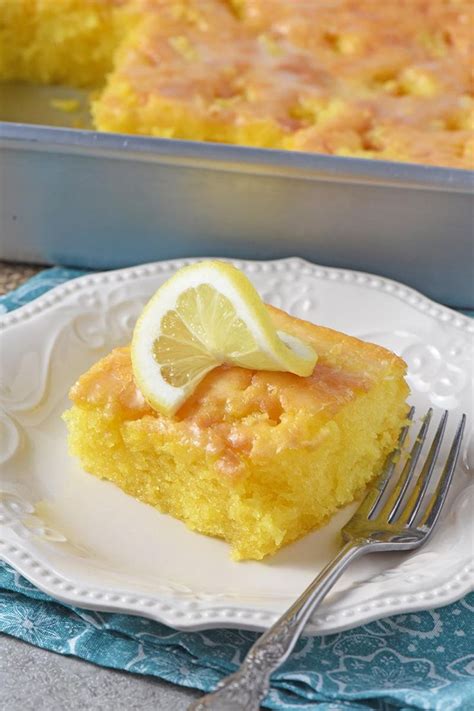 Easy And Delicious Lemon Cake On A Plate With A Fork