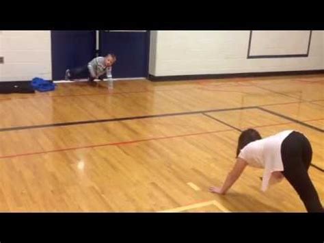 Cut a sheet of green 12″ x 18″ paper in half and use one half to cut blades of grass. Pin on Carly's P.E. Games
