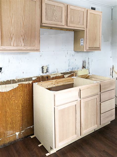 Shop for wholesale cabinets at liquidation prices. Unfinished Wood Cabinets To Make The Flip House Kitchen ...