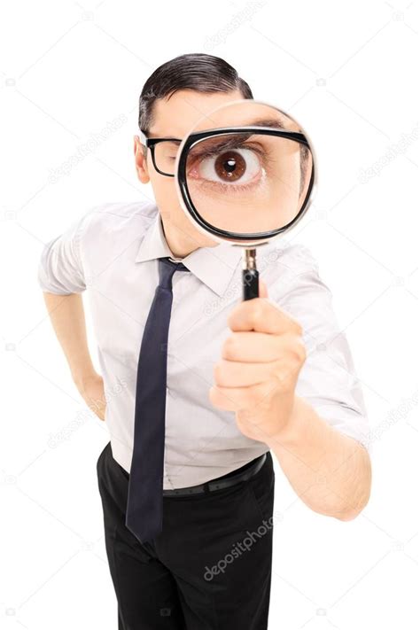 Man Looking Through Magnifying Glass — Stock Photo © Ljsphotography