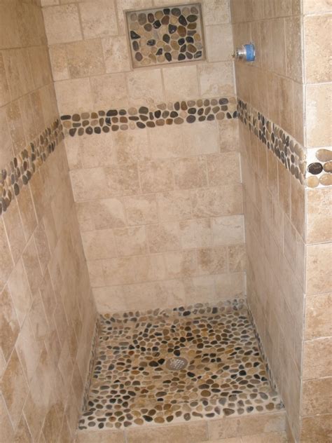 Take some river rocks and pebbles and paint half of them with one colour; Bathroom After- Shower stall with river rock | Bathroom ...