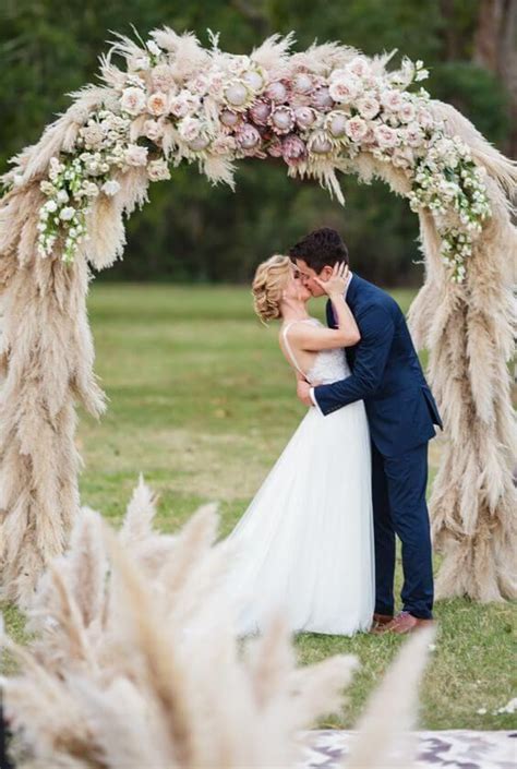 10 Romantic Floral Ceremony Arches For Summer Weddings