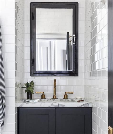 When designing a bathroom, the cabinets are among the key accessories. Black Medicine Cabinet with Black Bath Vanity ...