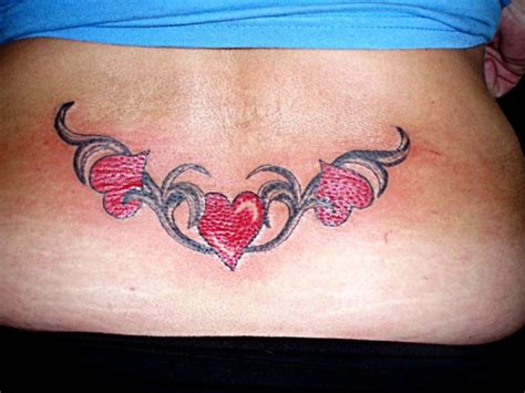 From wings and tribal art to family names and creative patterns, getting your lower back tattooed does require careful consideration. Lovely Heart Tattoo Designs On Lower Back For Female ...