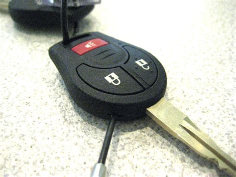 How do you open a nissan key fob? Change battery 2009 nissan key fob