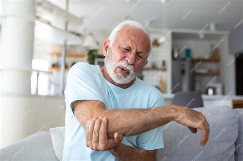 Premium Photo Senior Man With Arm Painold Male Massaging Painful Hand