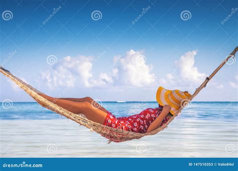 Girl Relaxing In A Hammock On Tropical Island Beach Summer Vacation In