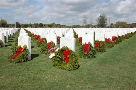 Image Wreaths In A National Cemetery National Cemetery Honoring