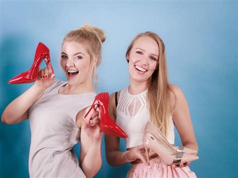 Women Presenting High Heels Shoes Stock Photo Image Of Fashionable