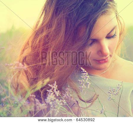 Beauty Romantic Girl Portrait Sensual Woman Lying On A Meadow With